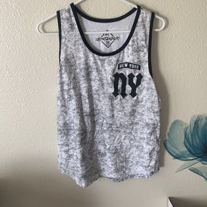 Small men’s muscle NYC upstander tee.